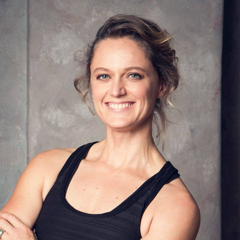 Professional headshot of Clare Hozack smiling, promoting pelvic floor education for pregnant women.