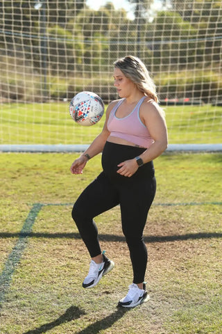 Katrina Gorry practicing ball control skills in athletic wear for Matilda’s training